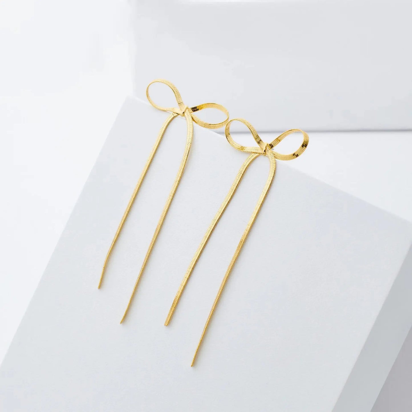Pendientes largos con lazo y borlas – Joyería de cadena plana para mujer, elegante y original