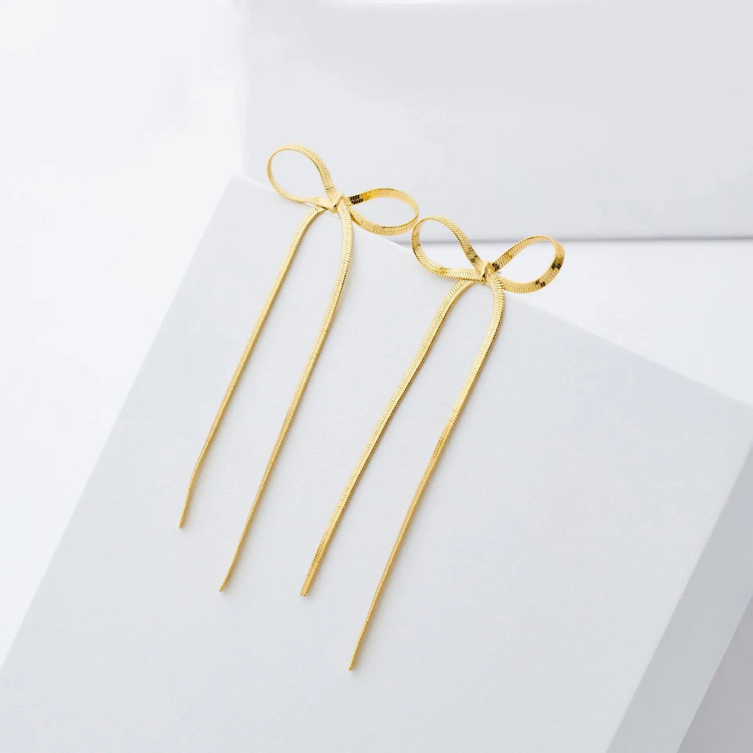 Pendientes largos con lazo y borlas – Joyería de cadena plana para mujer, elegante y original