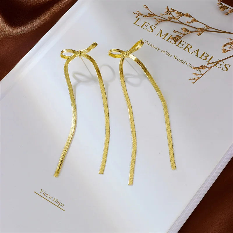 Pendientes largos con lazo y borlas – Joyería de cadena plana para mujer, elegante y original